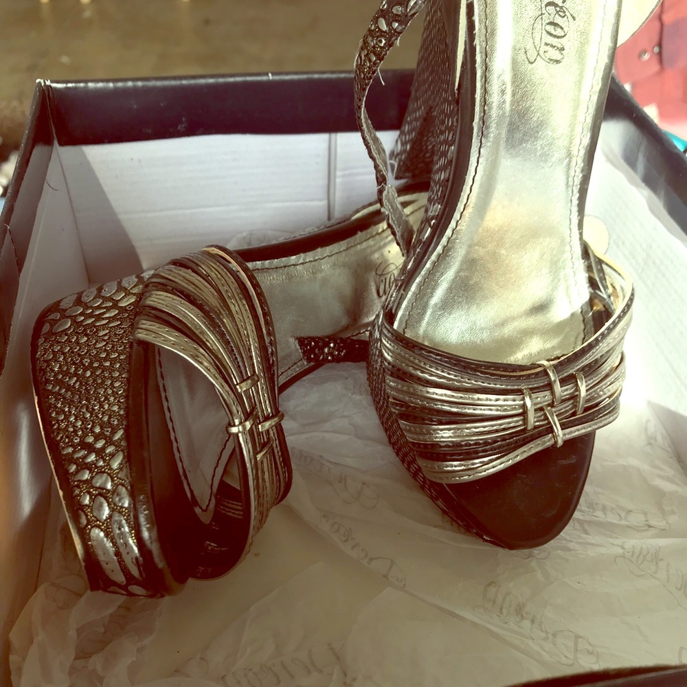 Black and silver platform sandals.